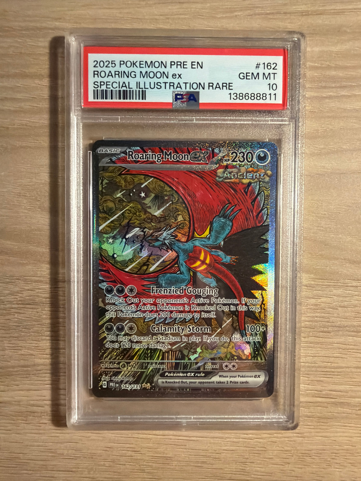 Roaring moon ex #162 PSA 10